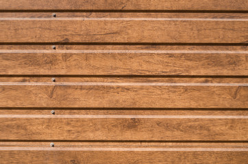 Brown siding that mimics the natural wood