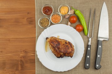 Chicken steak with vegetables. Grilled chicken breasts. Dietary meat on the grill. Chicken fried steak. 

