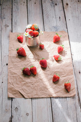 Fresh strawberries on wooden background