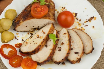 Chicken steak with vegetables. Grilled chicken breasts. Dietary meat on the grill. Chicken fried steak. 
