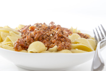 bowl of fresh pasta noodle and bolognese meat and tomato sauce i