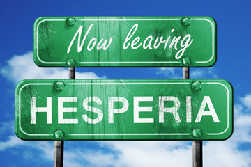 Leaving hesperia, green vintage road sign with rough lettering