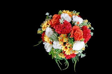 artificial flower isolated on black background