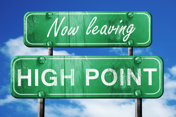 Leaving high point, green vintage road sign with rough lettering