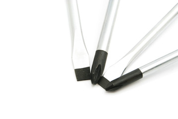 different screwdrivers on white