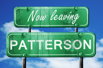 Leaving patterson, green vintage road sign with rough lettering