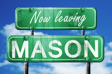 Leaving mason, green vintage road sign with rough lettering