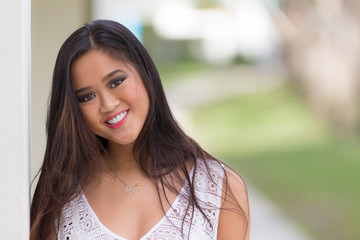 Portrait of a smiling young Asian woman