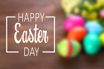 Easter greeting text on blurred festive background