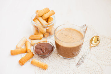 coffee and flour sticks on a table, selective focus