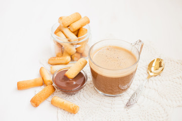 coffee and flour sticks on a table, selective focus