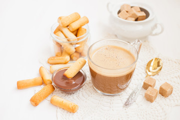 coffee and flour sticks on a table, selective focus
