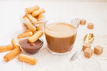 coffee and flour sticks on a table, selective focus