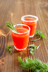 tomato juice in glasses on a table, selective focus