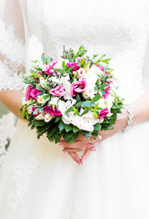 nice wedding bouquet in bride's hand