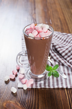 hot chocolate with a souffle in a glass on a table, selective focus