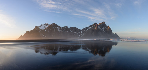 Stocknes moutines in a water reflection Iceland