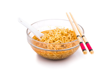 Bowl of convenient but unhealthy instant noodle with sodium flavored soup on white background 