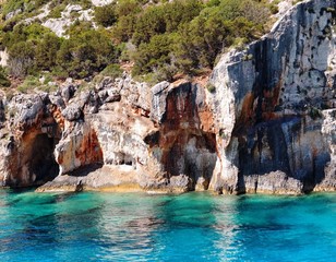Fototapeta na wymiar Beatufiul sea against colorful rocks. Zakynthos Island, Greece