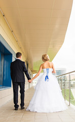 Nice young wedding couple outdoors