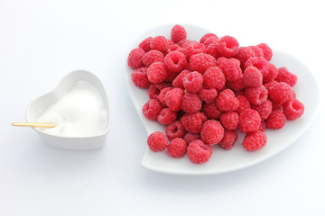 Framboises et sucre en poudre