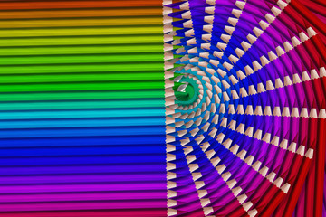 composition of colored pencils on white background