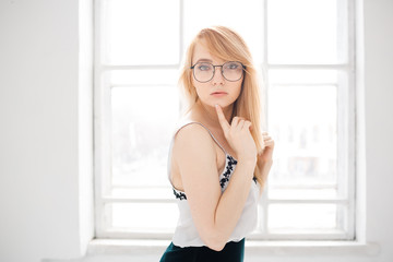 Studio portrait of beautiful trendy girl