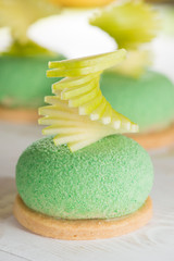 closeup tasty cake with green apple and pear