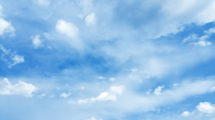 bright blue cloudy sky background