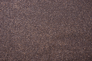 Close up of dark sand texture