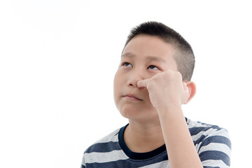 Asian boy Picking a booger on white background.