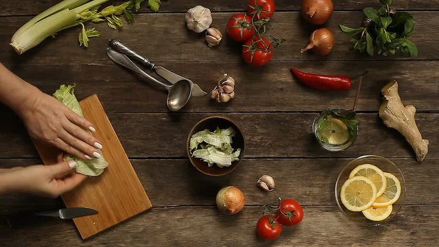 lettuce leaves on a wooden table top view