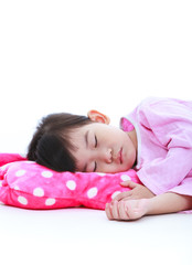 Obraz na płótnie Canvas Healthy children concept. Asian girl sleeping peacefully. Isolated on white.