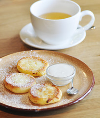 Delicious pancakes with sauce 