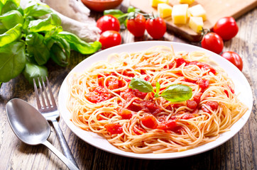 plate of pasta with tomato sauce