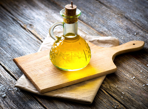 Olive oil on vintage  wooden table