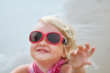 Portrait of fun happy girl wearing hat,  Italy, outdoor