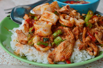 stir-fried curry squid and pork on plain rice