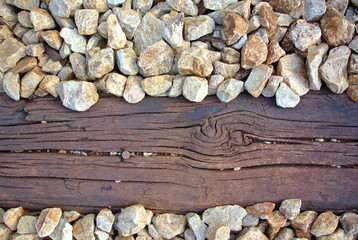Wooden plank and crushed stones