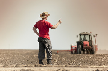 Work on field during soy planting time