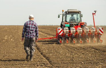 Work on field during soy planting time