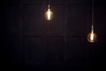  antique edison style light bulbs against wall
