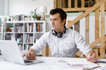 Fototapeta premium Young businessman in office
