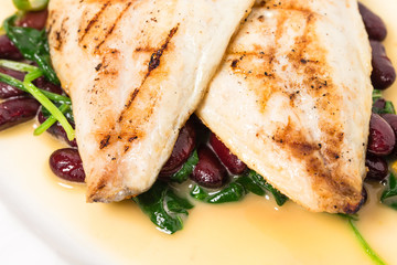 Delicious baked dorado fillet with chard.