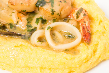 Delicious scallops and mussels with polenta.