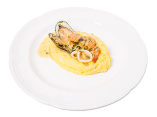 Delicious scallops and mussels with polenta.