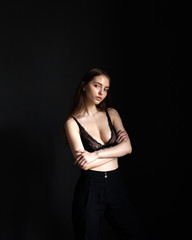 Fototapeta na wymiar Girl in black luxury lingerie