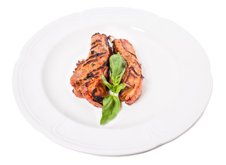 Delicious grilled pork shish kebab with basil.