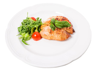 Grilled chicken fillet with tomatoes cherry.