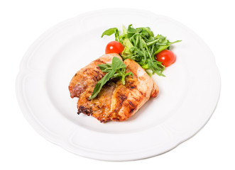 Grilled chicken fillet with tomatoes cherry.